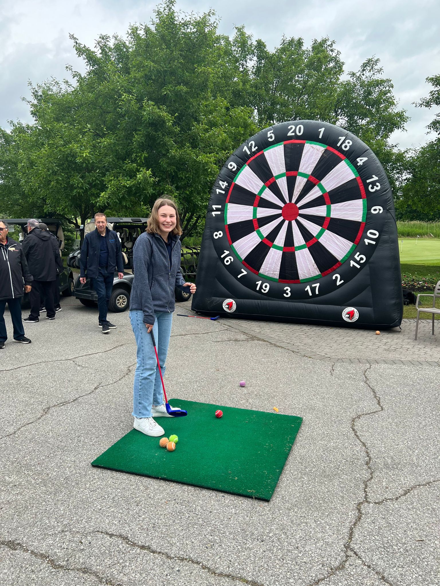 Olesia Lytvyn participates in the Inflatable Putting Contest!