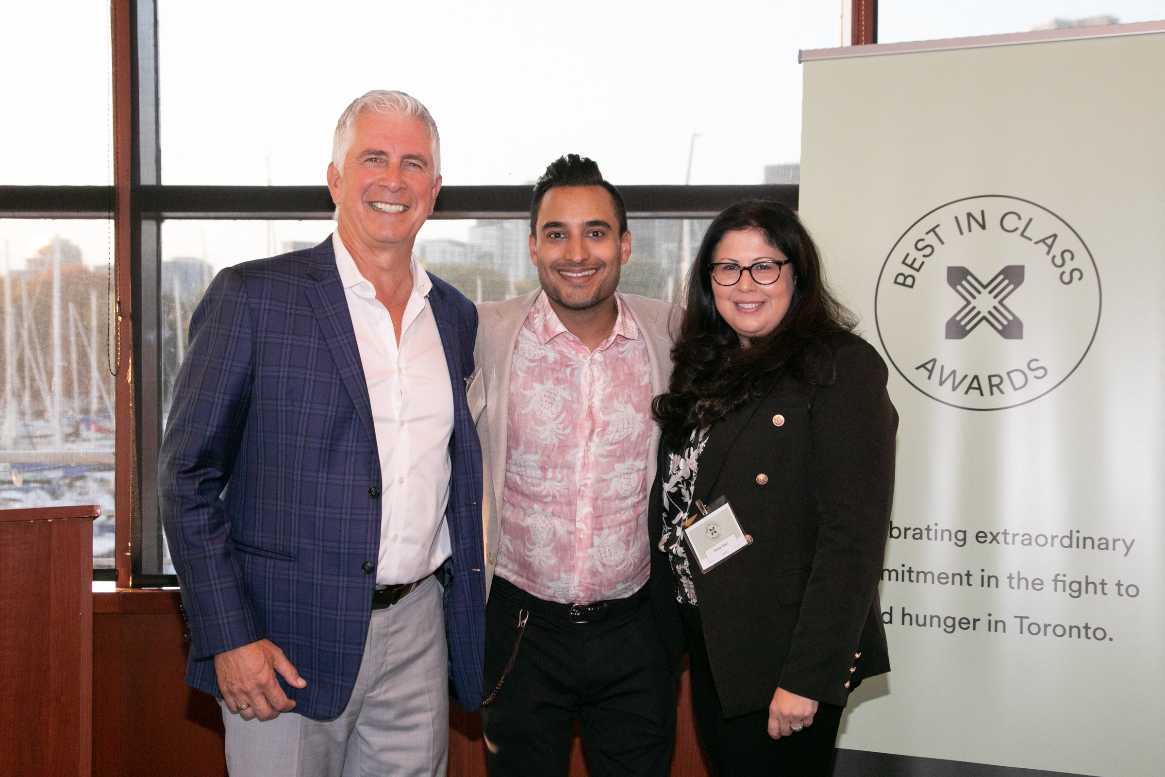 From left: President and CEO, John Sabo, event emcee and radio personality, Gurdeep Ahluwalia, and Director of Communications and Customer Relations, Sonia Gallo at Daily Bread's Best in Class Awards, held at the National Yacht Club, Toronto.