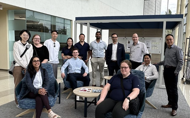 OECM Staff takes end of tour group photo with Anthony Elder, Regional Sales Director, and Richard Scott, National Manager of Experiential Marketing.