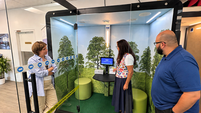Rachel Sekler, CEO, Kubebooth showing OECM accessibility features controlled within the pod