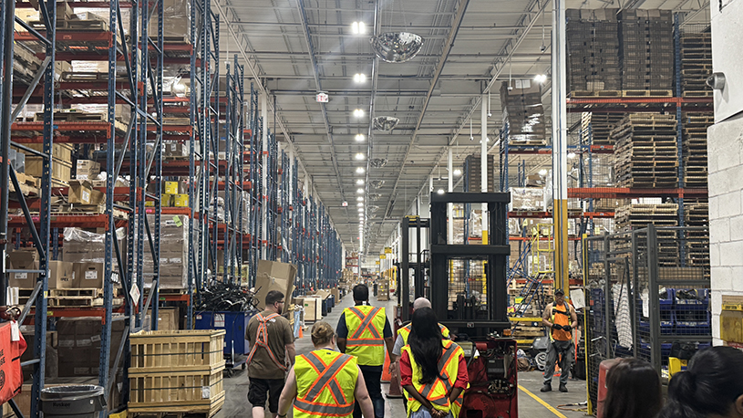 OECM representatives tour the warehouse at Noble’s Vaughan distribution centre.