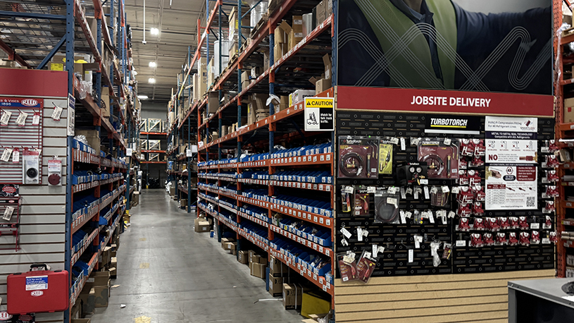 Shelves stocked with plumbing, HVAC and mechanical products inside Noble’s Vaughan facility.